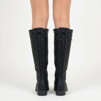 Black knee-high lace-up boots, three-quarter view showing the side lacing