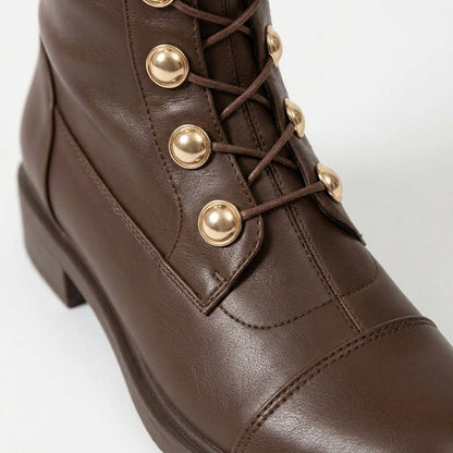 Brown boots, lacing detail