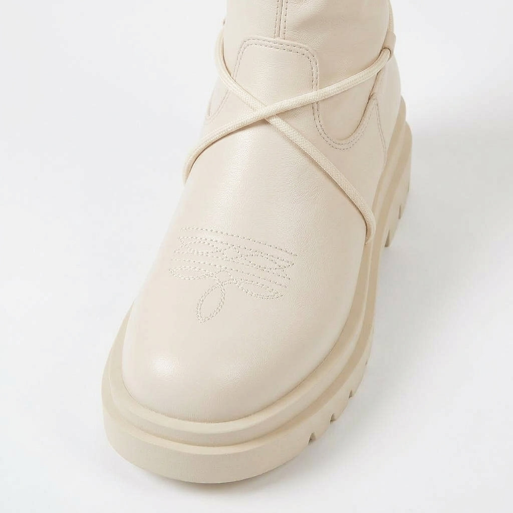 White boots, cord lacing detail