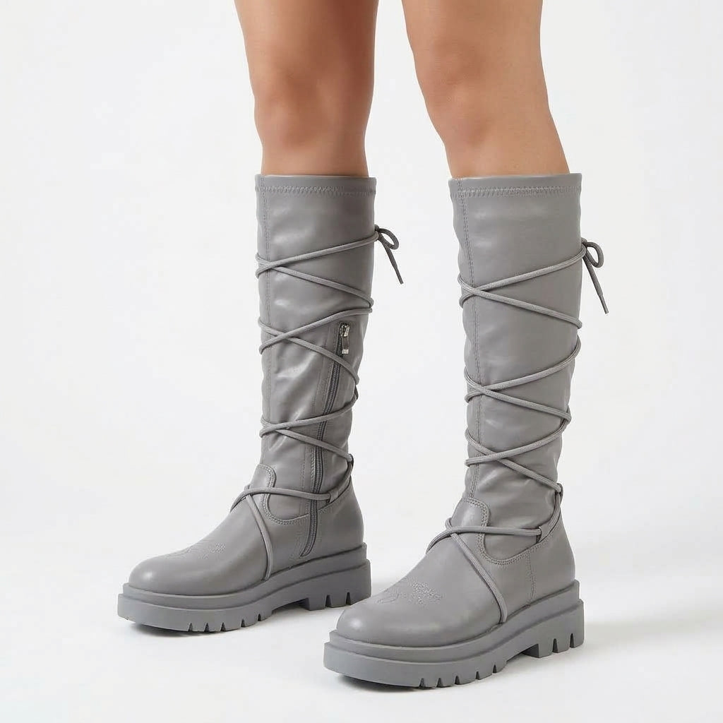 Grey boots, three-quarter view