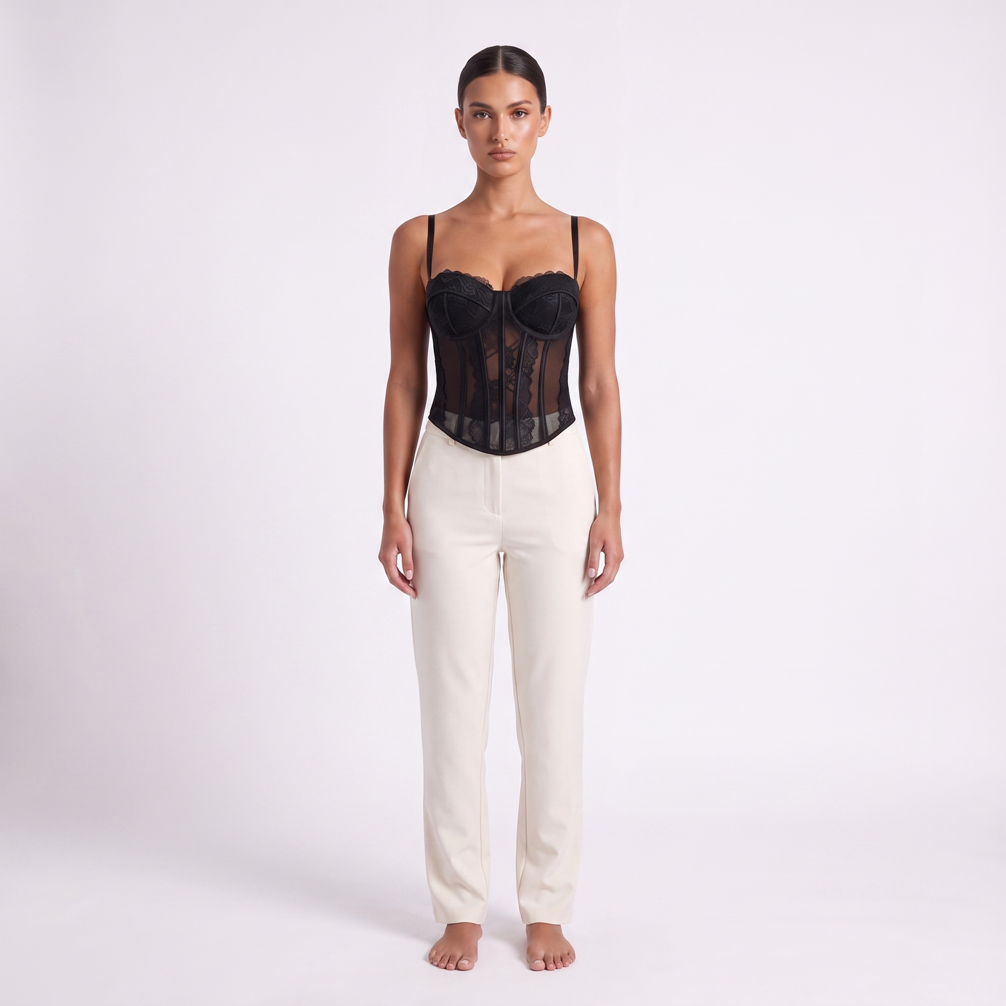 Womens lace corset top in black, full-length front studio view