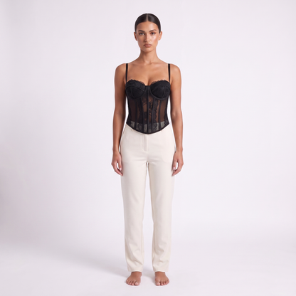 Womens lace corset top in black, full-length front studio view