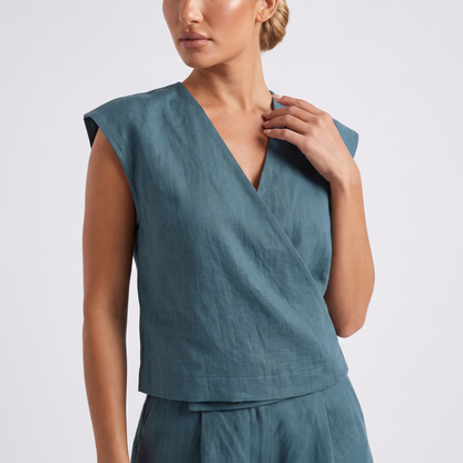 Maeve teal linen set - top detail, surplice V neck wrap in crisp structured linen