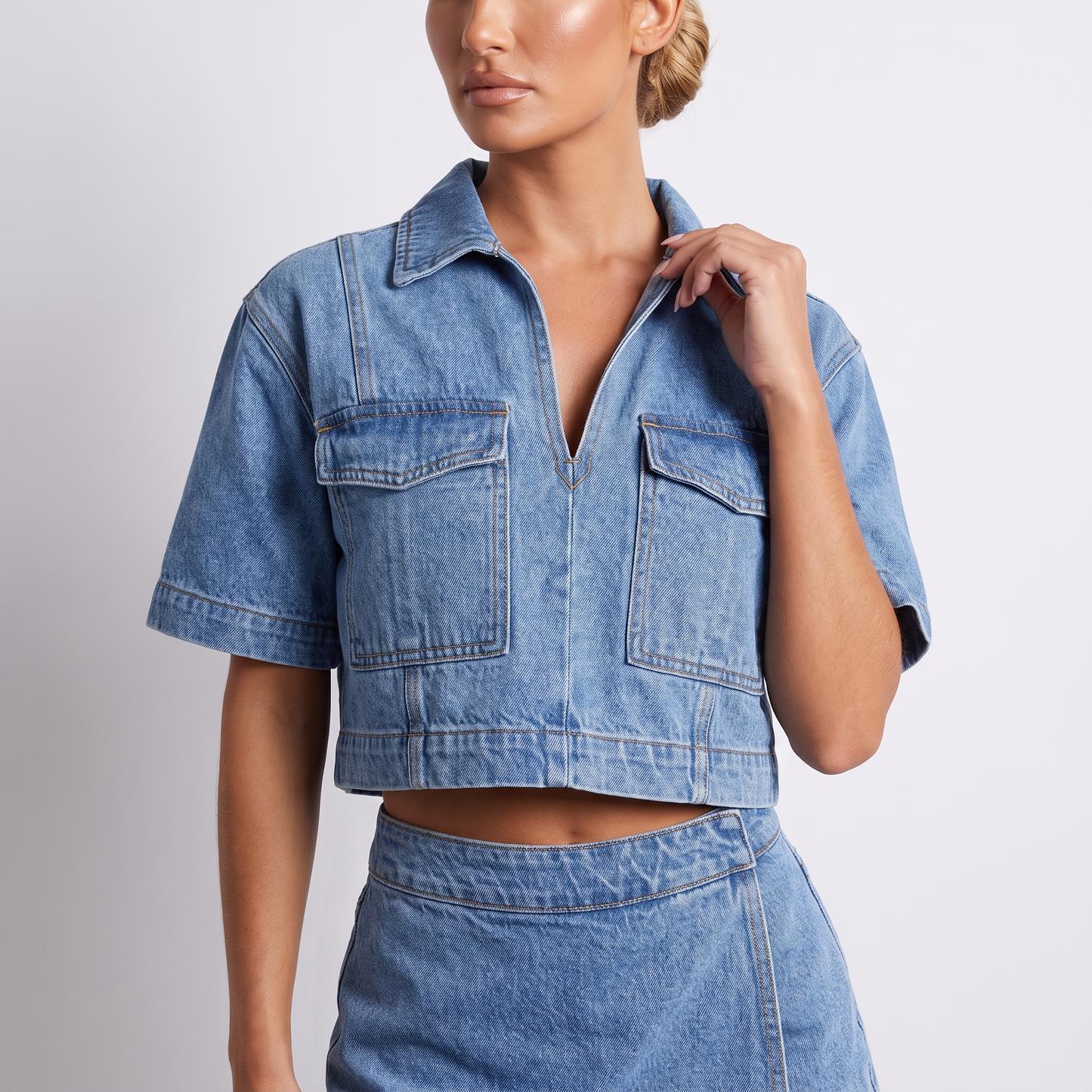 Detail - cropped denim shirt jacket with flap chest pockets