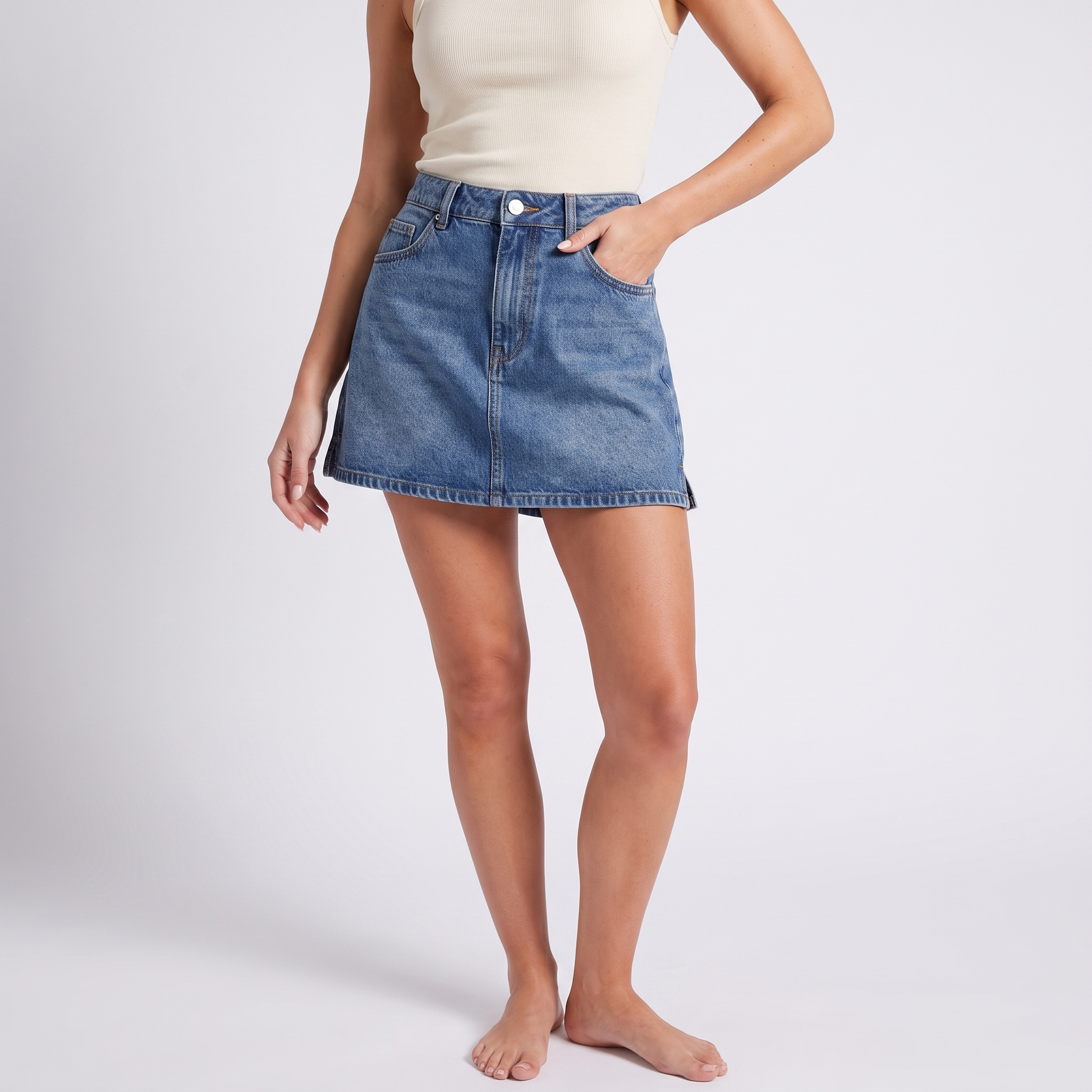 Denim A-line mini skort in blue - hero detail