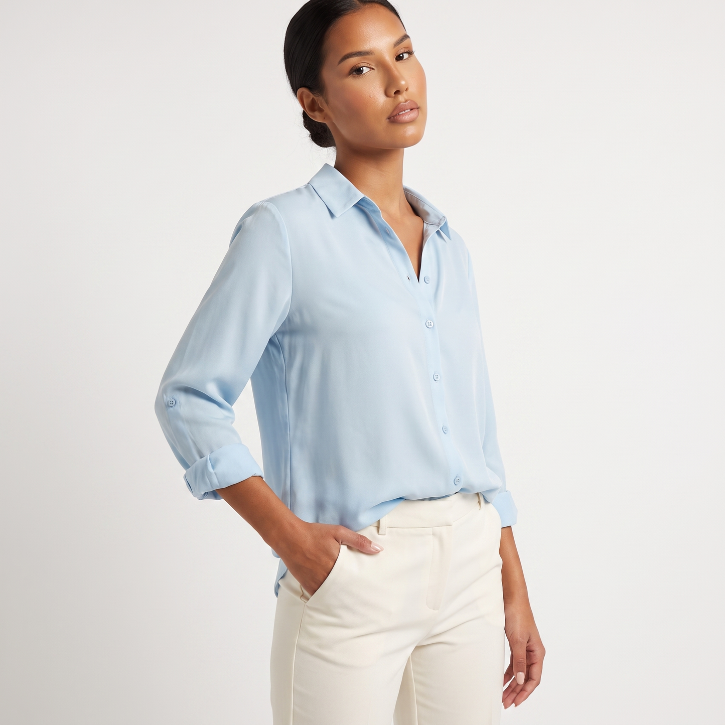 Powder blue button-front blouse, three-quarter view