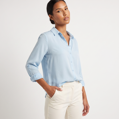 Powder blue button-front blouse, three-quarter view