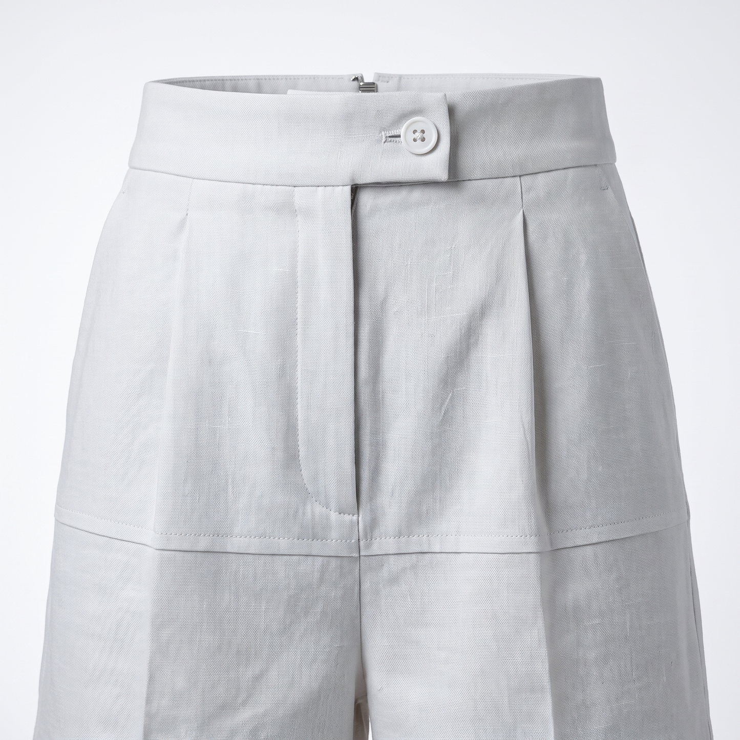 White high-waist tailored linen shorts – waistband, hook-and-bar and fly detail