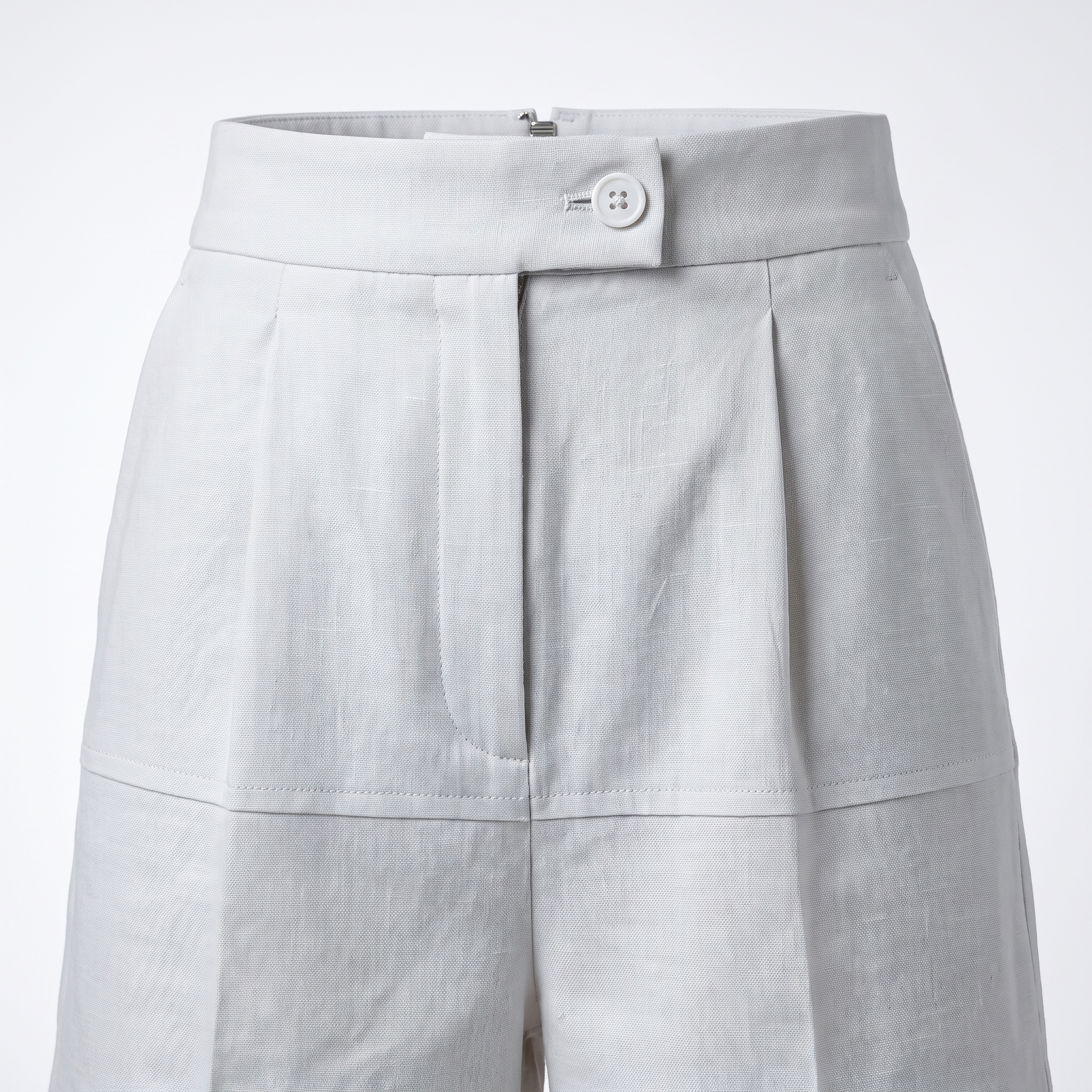 White high-waist tailored linen shorts – waistband, hook-and-bar and fly detail