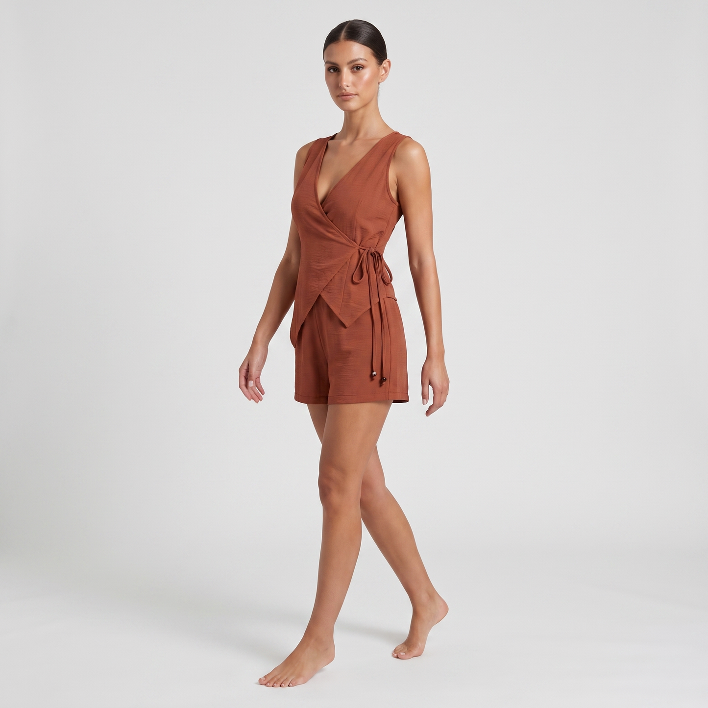 Terracotta rust wrap top and shorts co-ord – three-quarter view