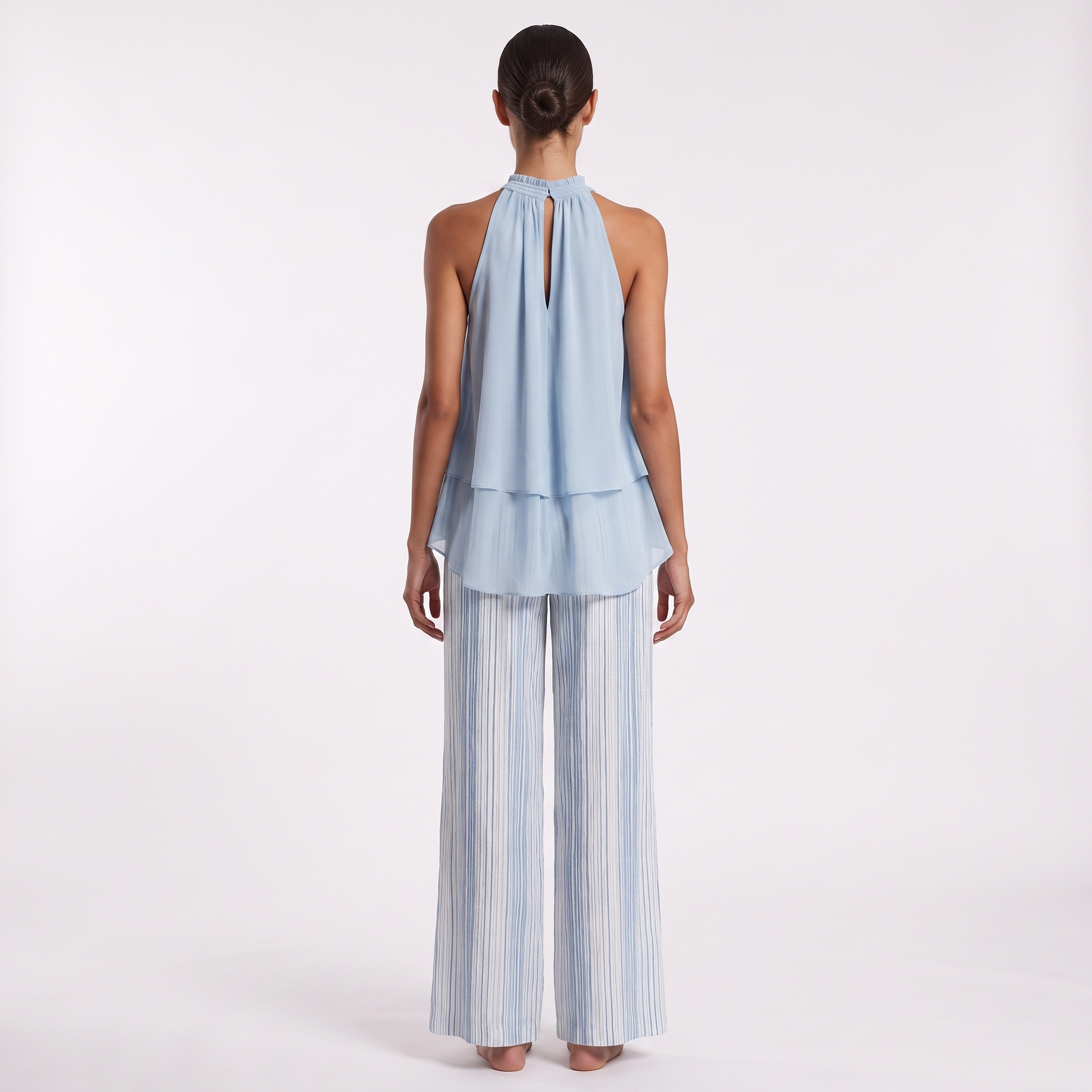 Sky blue chiffon top and striped trousers set, back view