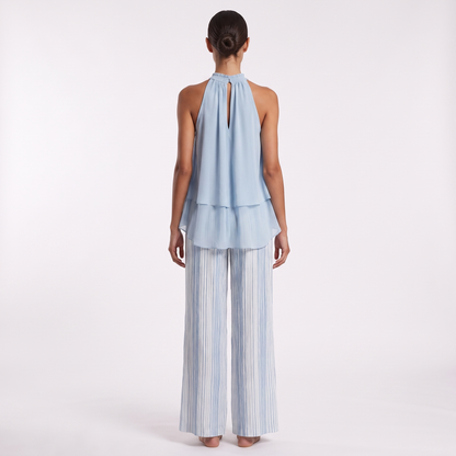 Sky blue chiffon top and striped trousers set, back view