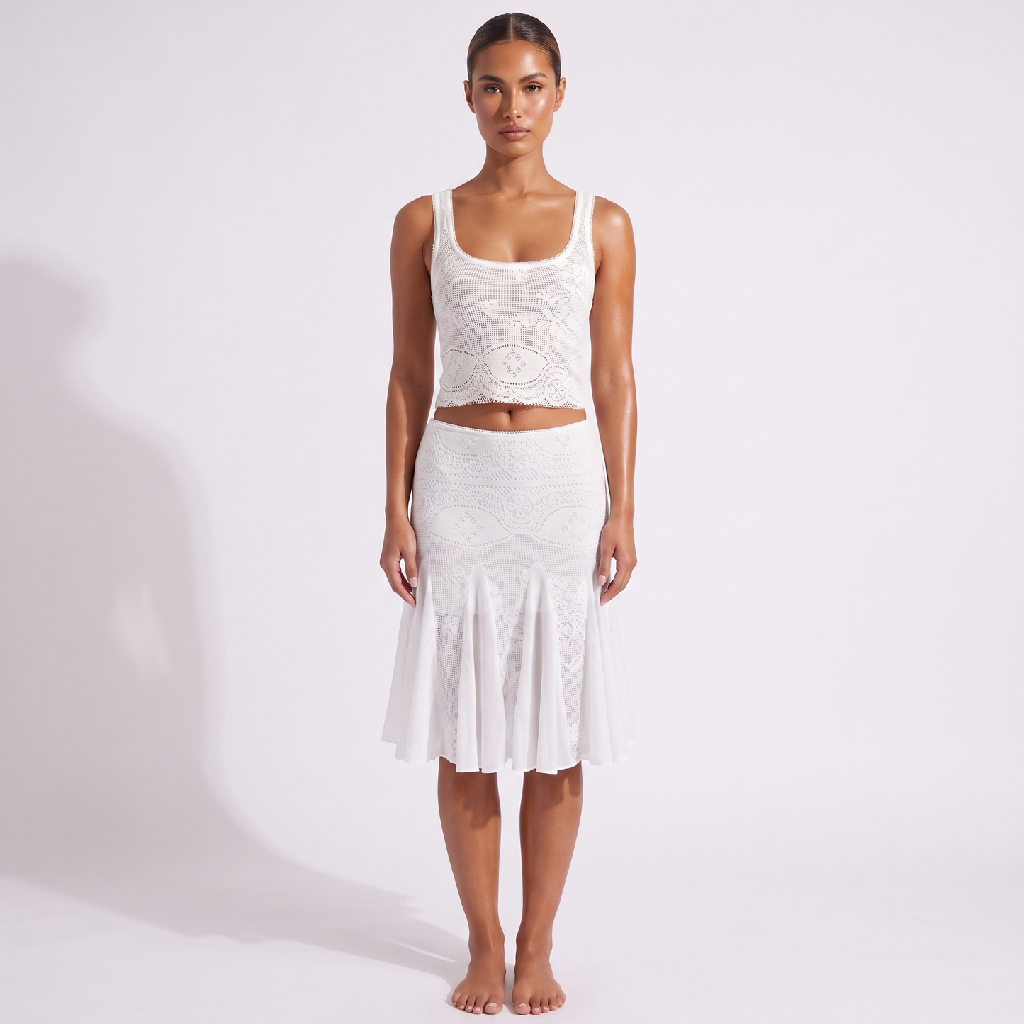 White textured-knit crop top and fishtail midi skirt set, full-length front