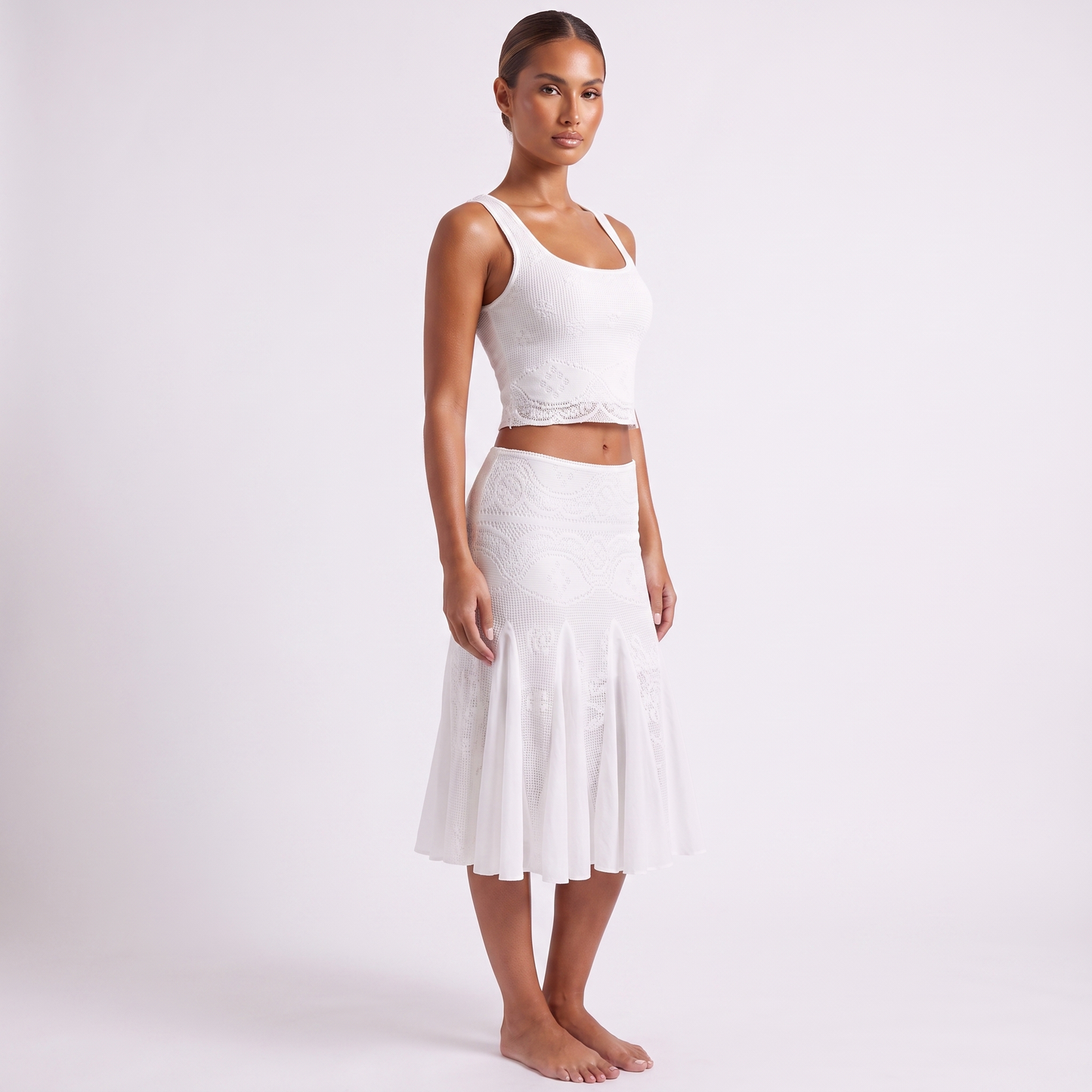 White textured-knit crop top and fishtail skirt set, three-quarter view