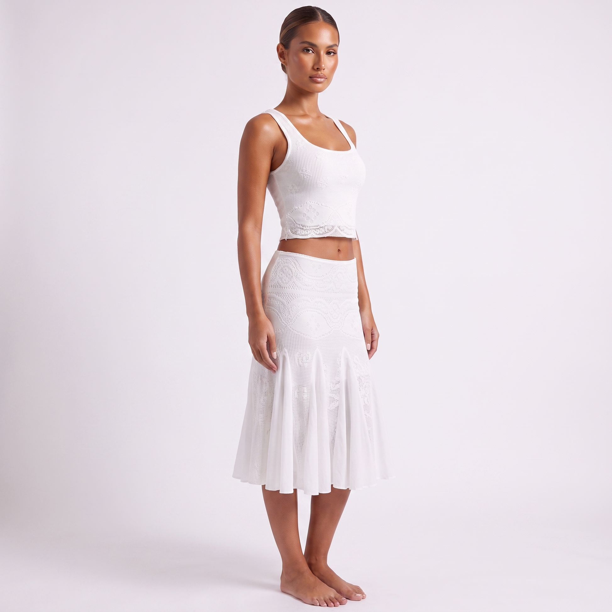 White textured-knit crop top and fishtail skirt set, three-quarter view