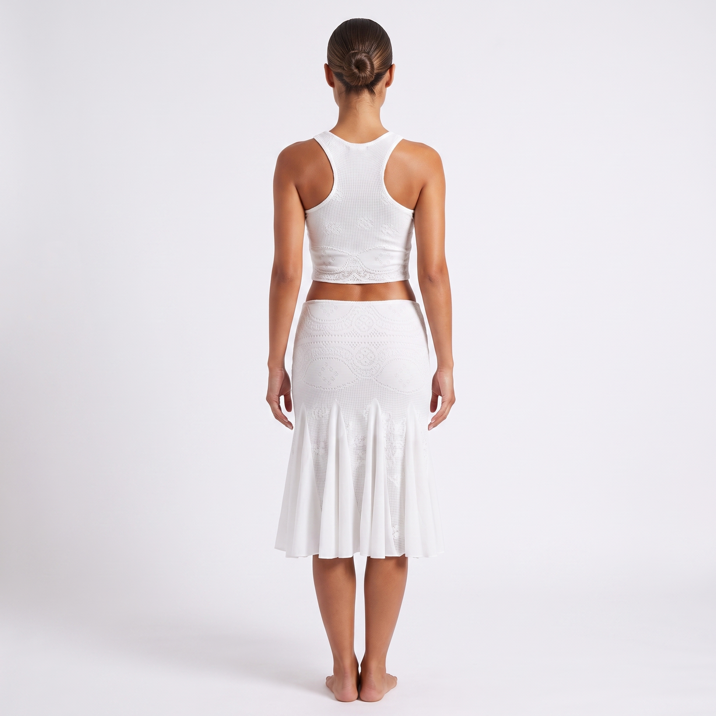 White textured-knit crop top and fishtail skirt set, back view