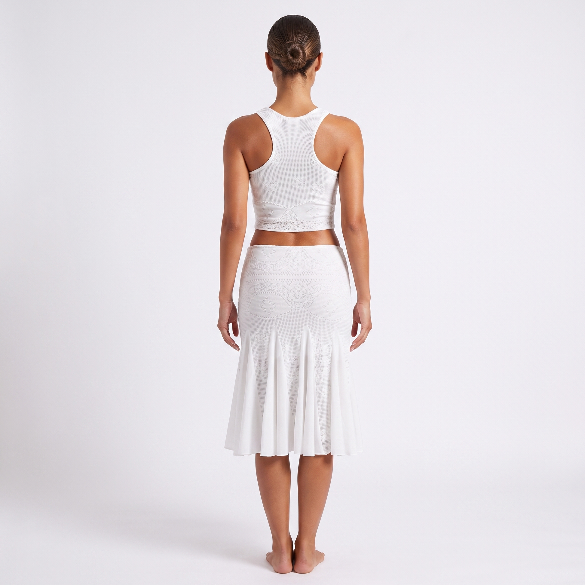 White textured-knit crop top and fishtail skirt set, back view