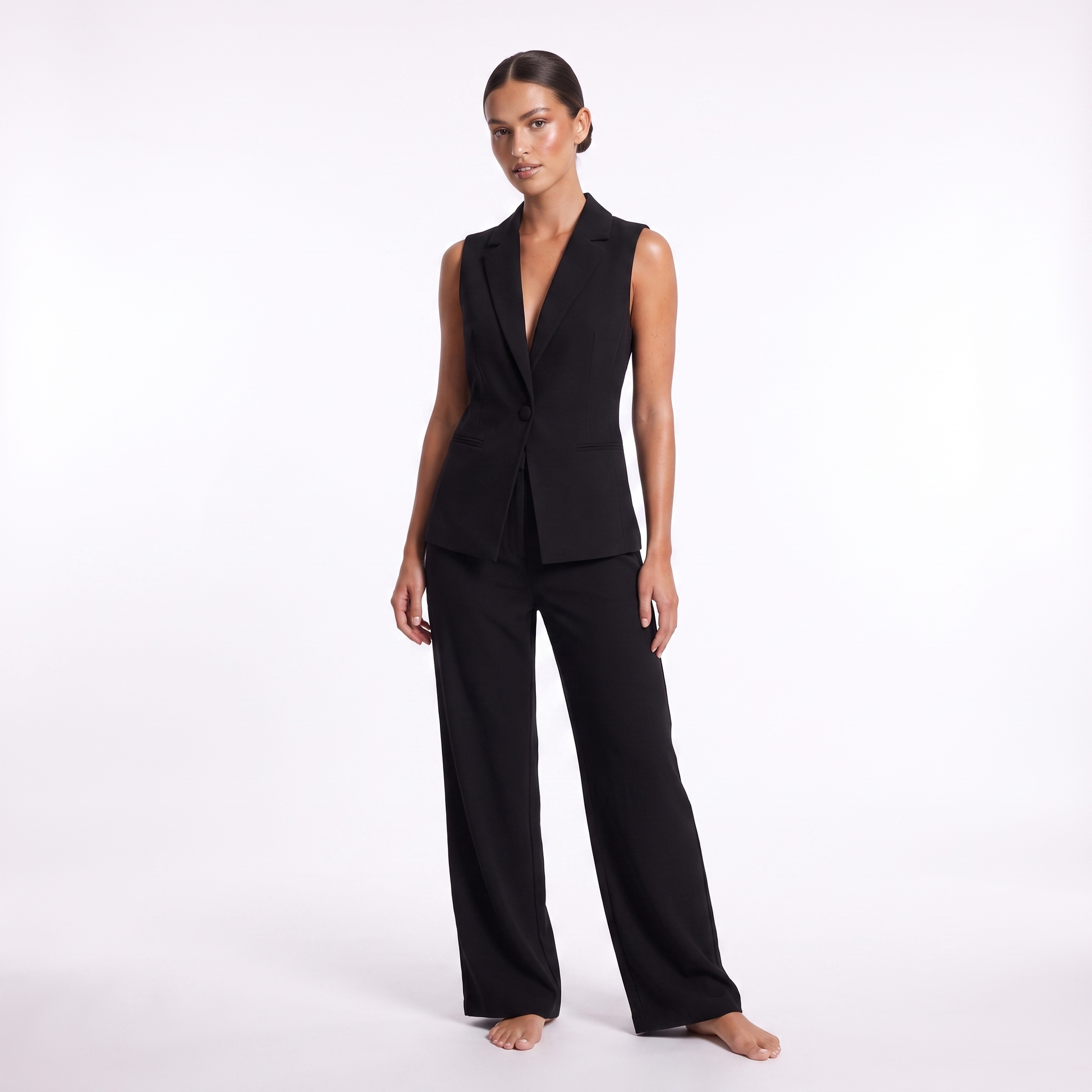 Sleeveless vest and trousers suit set in black, front