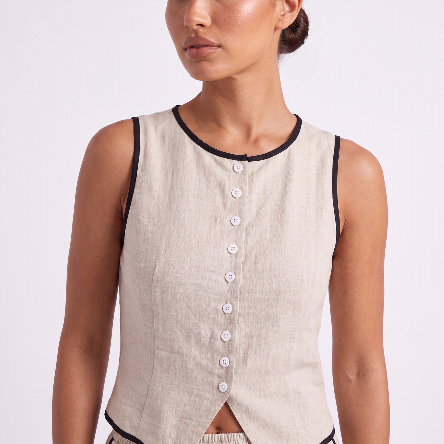Vest detail, black bias binding and button placket