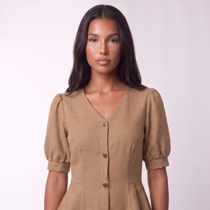 Neckline and gold button placket detail