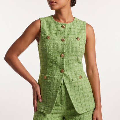 Vest detail with gold knot buttons and tweed weave