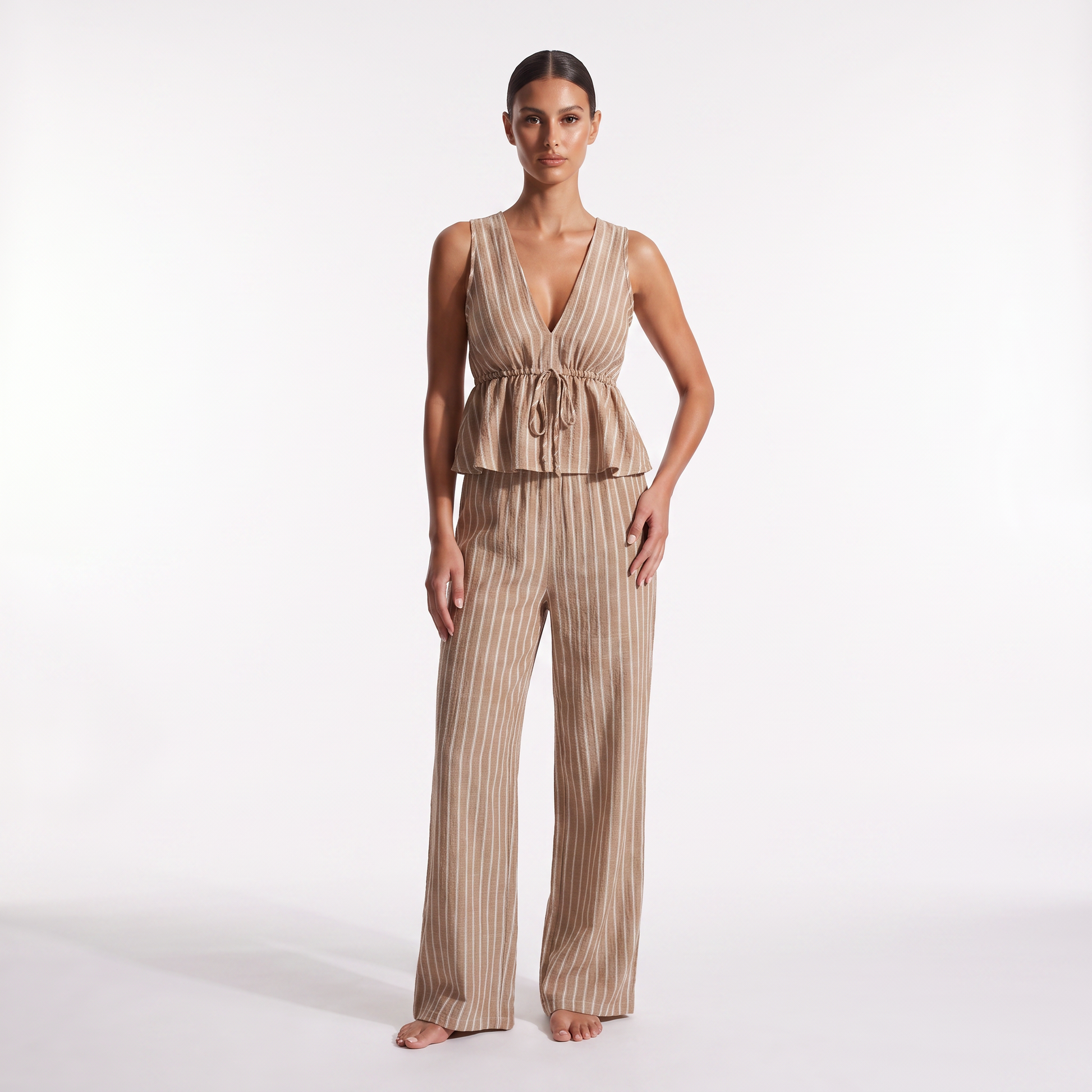 Khaki striped sleeveless V-neck peplum top and wide-leg trouser set, full-length front view