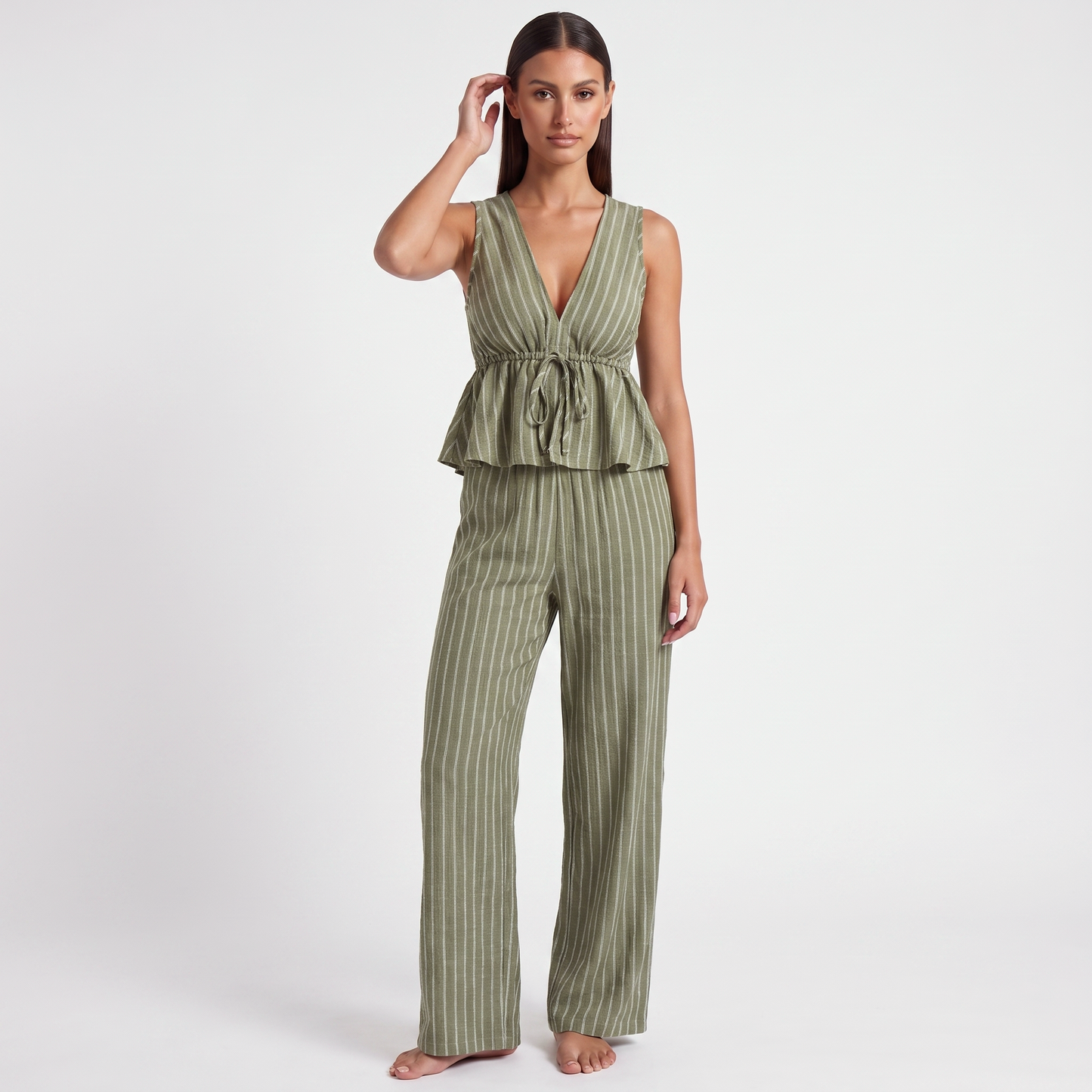 Olive green striped sleeveless V-neck peplum top and wide-leg trouser set, full-length front view