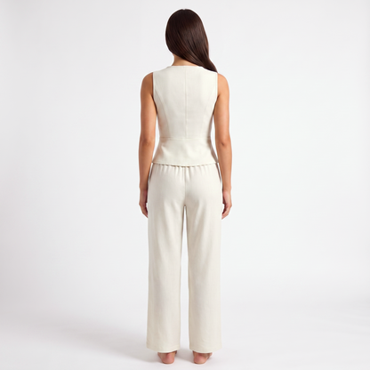 White vest and trouser set, back view showing plain vest back and gathered trouser waistband