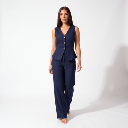 Navy sleeveless V-neck peplum vest and high-waisted wide-leg trouser set, full-length front view